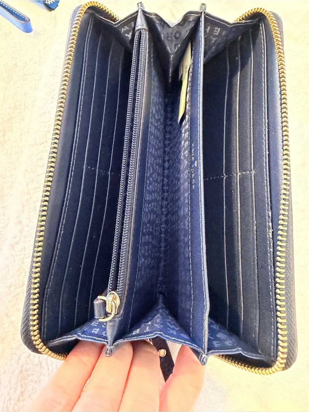 kate spade navy pebbled zip-around wallet with gold plate